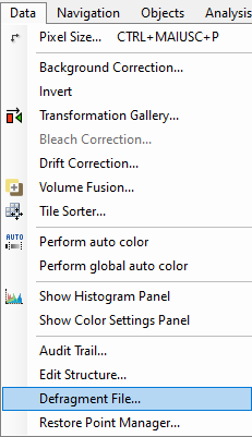 Data menu dropdown with 'Defragment File...' highlighted under tabs 'Data Navigation Objects Analysis'