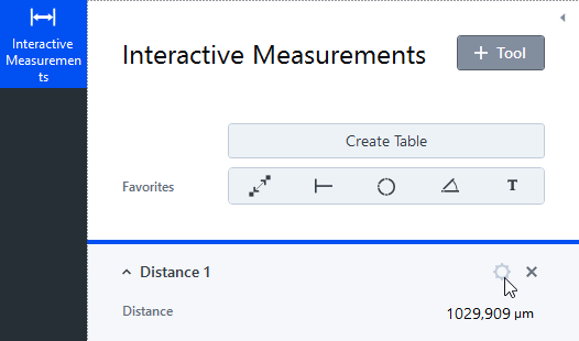 Interactive Measurements panel showing Distance 1 value 1029,909 µm