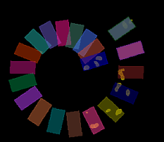 Circular spiral of colored rectangular segments with small highlighted yellow spots in some segments