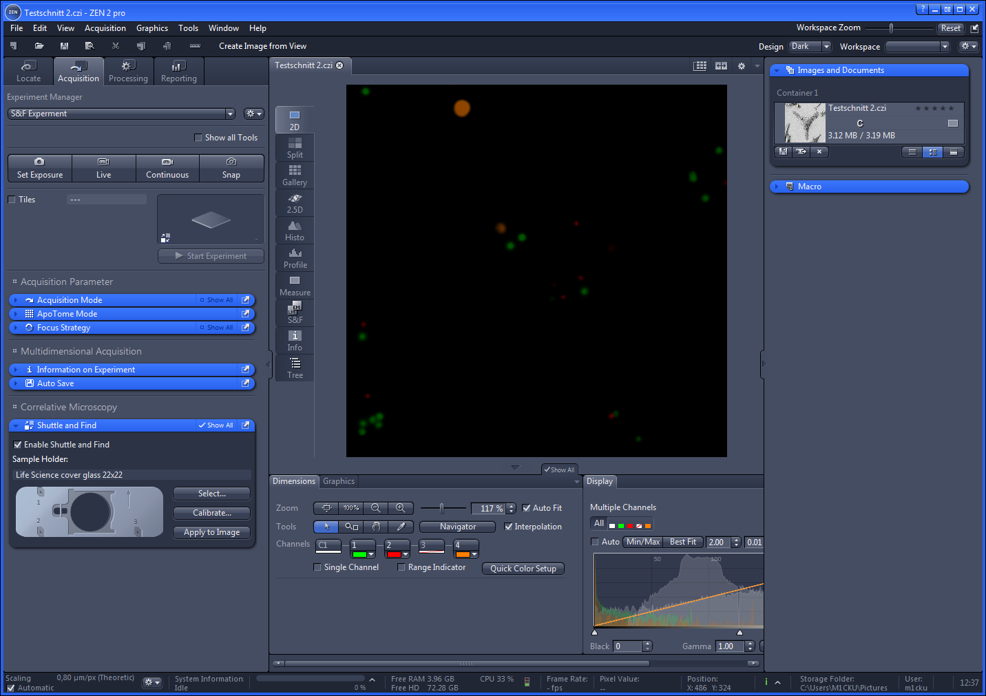 ZEN 2 pro window showing Testschnitt 2.czi viewer with black field of green, red, orange dots and left Acquisition panels