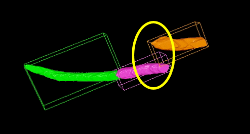 Green, magenta and orange 3D shapes with wireframe boxes on black background and a yellow circle highlighting their junction