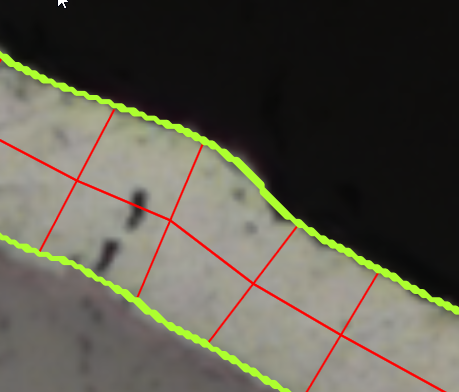 Light beige sample bordered by neon green wavy overlay with red grid of measurement chords on dark background