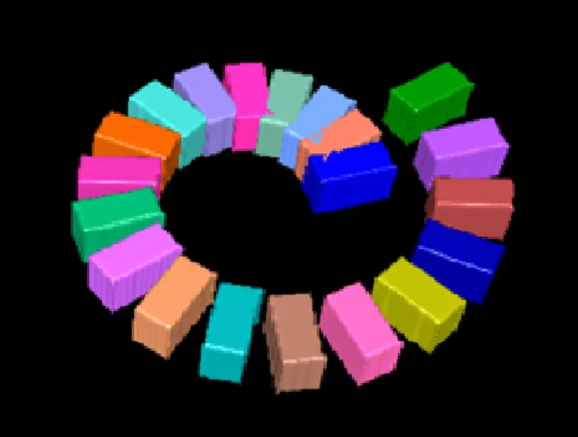 Spiral arrangement of colorful 3D rectangular blocks forming a ring on a black background