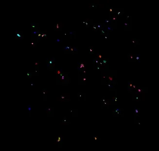 Black background with scattered small multicolored blobs